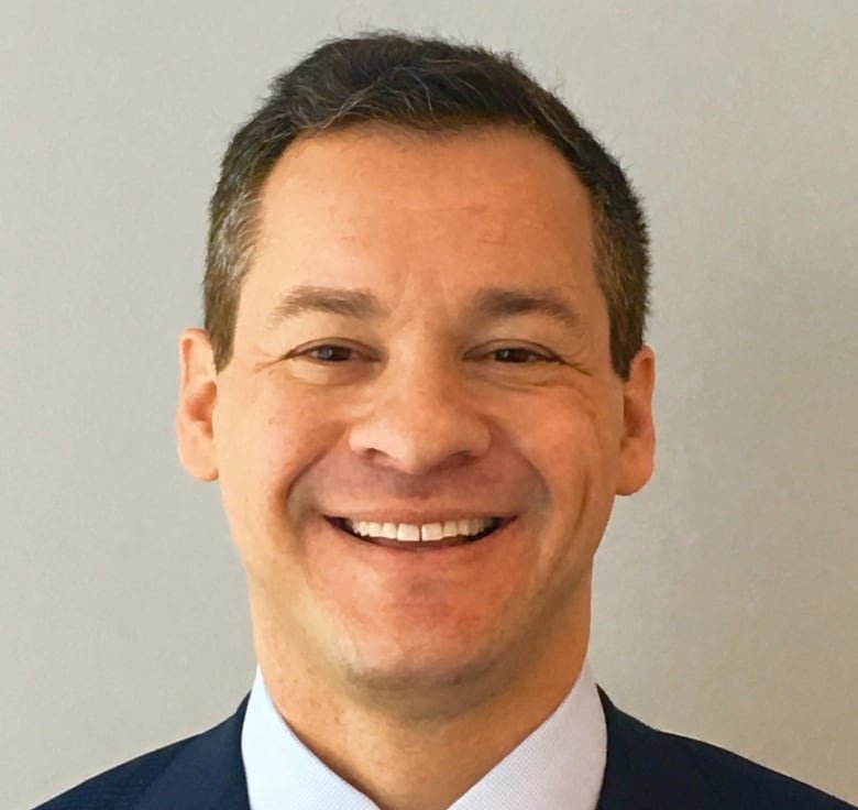jared-genser Headshot of a smiling man in a suit