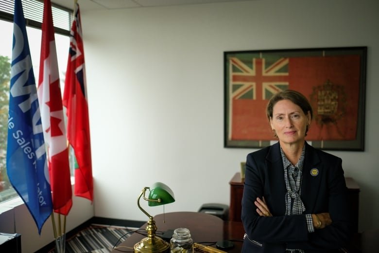 Maureen Harquail, CEO of the Ontario Motor Vehicle Industry Council (OMVIC), in her Toronto office. The vehicle sales watchdog head says that consumers need to ensure they are purchasing cars from licensed dealers.