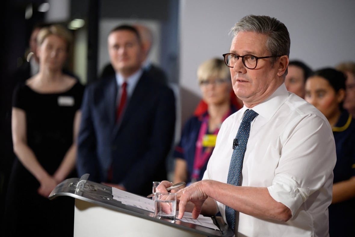 Britain's Prime Minister Keir Starmer answers a question from the media during a visit to the Elective Orthopaedic Centre at Epsom Hospital on January 06, 2025 in Epsom, Britain.