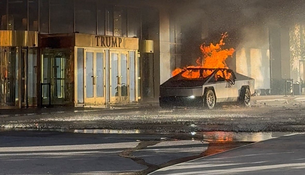 tesla-cybertruck-fire-1 Flames rise from a Tesla Cybertruck after it exploded outside the Trump International Hotel Las Vegas.