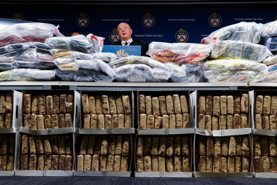ont-toronto-cocaine-bust-20250121 Toronto Police Chief Myron Demkiw speaks to media behind a wall of seized drugs during a press conference announcing the seizure of 835 kilograms of cocaine, in Toronto on Tuesday, Jan. 21, 2025.