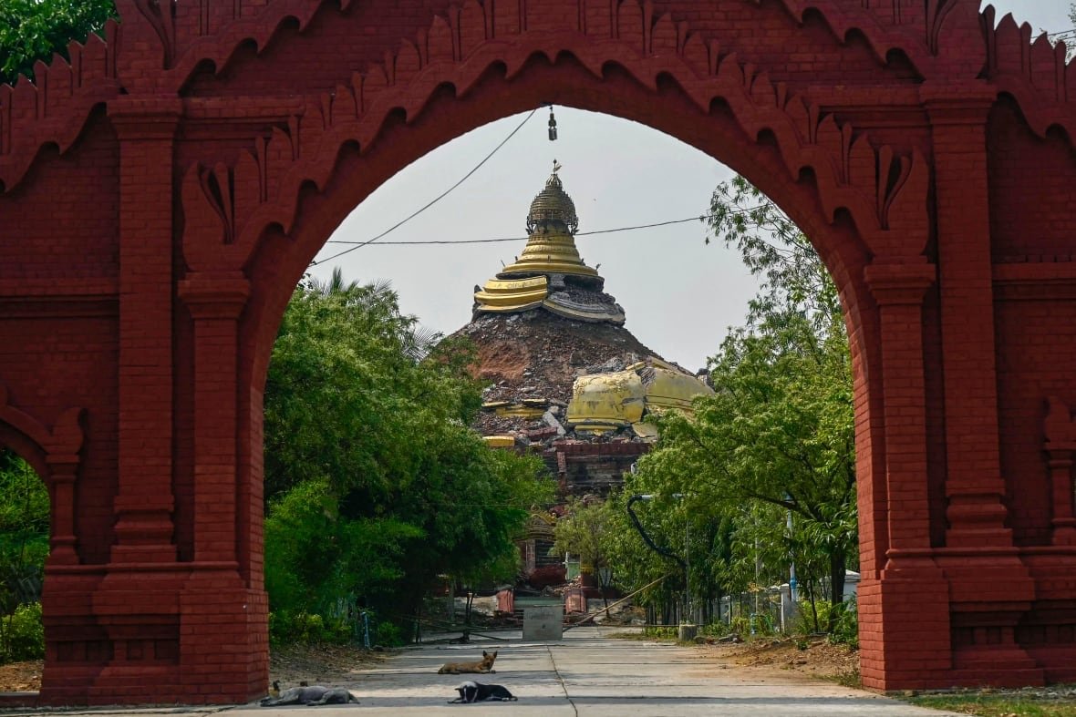2206789441 A damaged pagoda is pictured.
