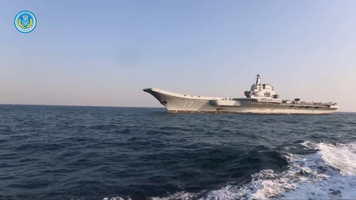 china-taiwan-military-1 A large aircraft carrier ship on the water is shown
