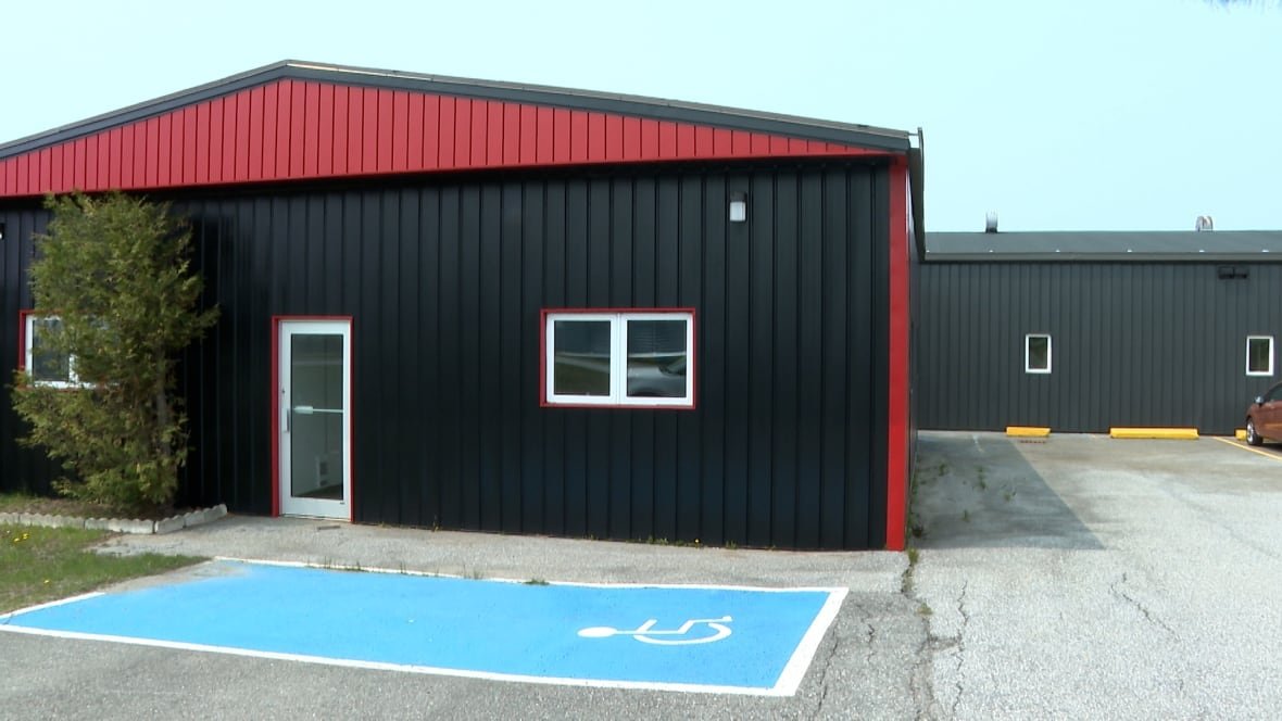 indigenous-childcare-centre-building A large building and parking lot.