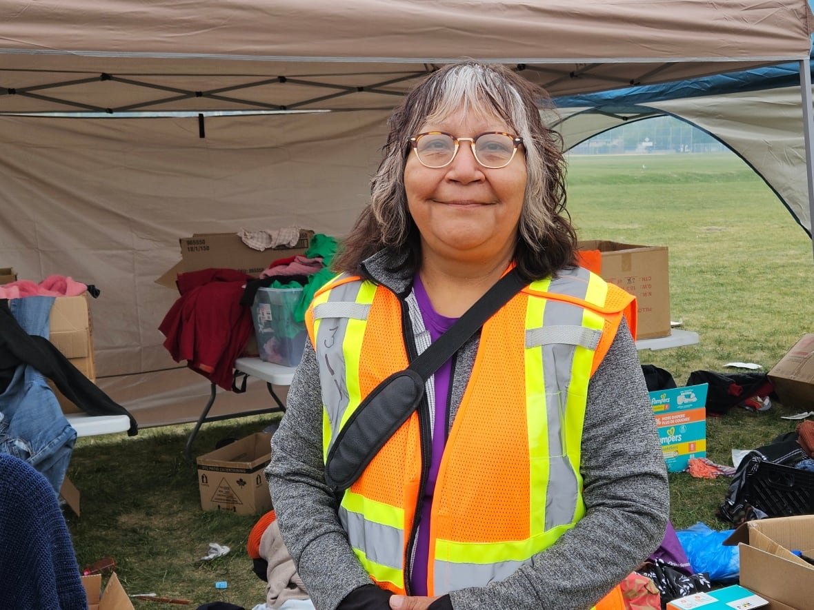 mary-sylvia-caribou A woman with a vest looks at the camera.