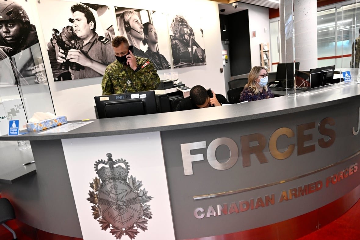 Staff work at a Canadian Armed Forces recruitment centre in Ottawa on Sept. 20, 2022.