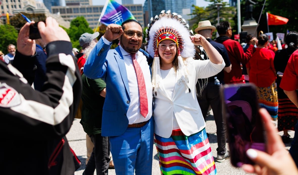 ont-debates-20250602-1 NDP MPP Sol Mamakwa, left, takes a photo with AFN National Chief Cindy Woodhouse during a demonstration opposing Bill 5, outside the Ontario Legislature at Queen's Park in Toronto on Monday.