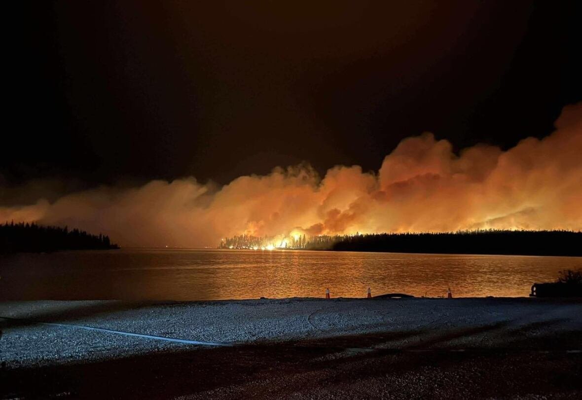 sherridon-wildfire A major forest fire is seen across a lake