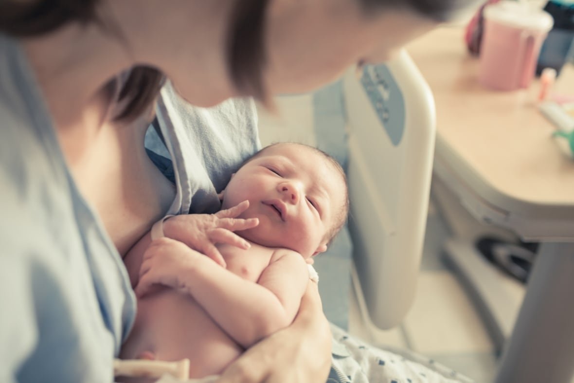 shutterstock-huge-file A baby and mother are seen in hospital in this stock photo.