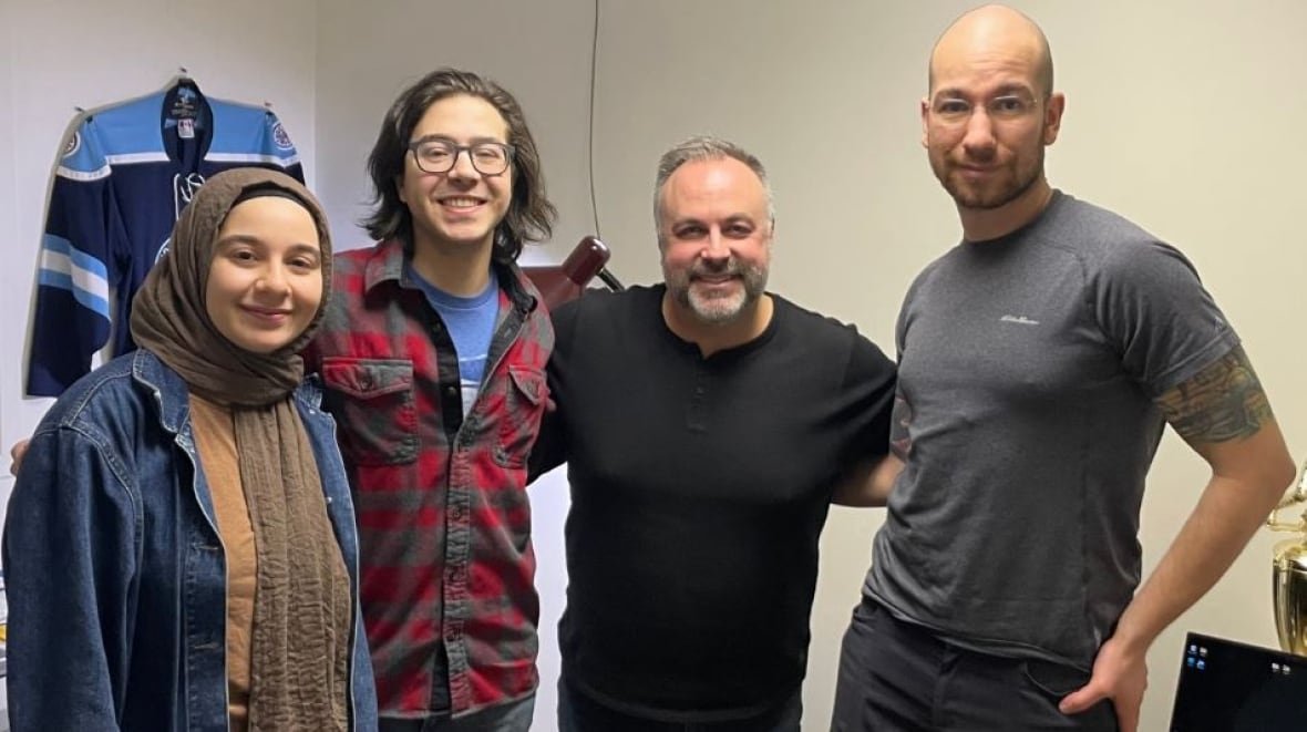 waterloo-hockey-brain-researchers Four people standing side-by-side