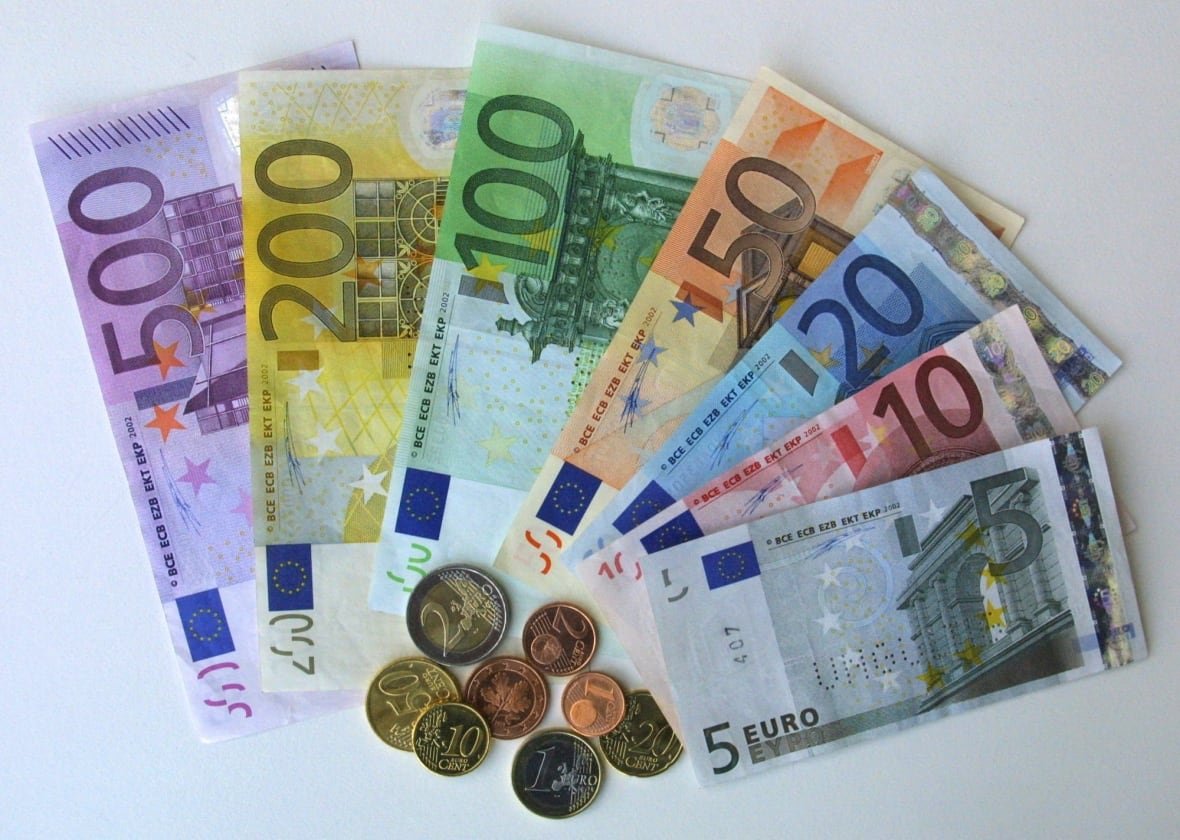 German Euro notes and coins pictured in the regional central bank in Bremen, northwest Germany, Friday, Dec. 14, 2001.