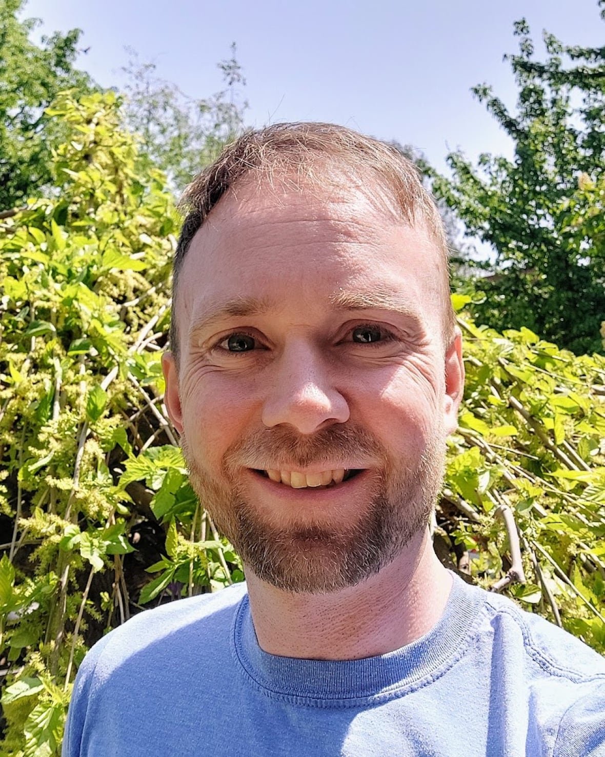 A smiling man.