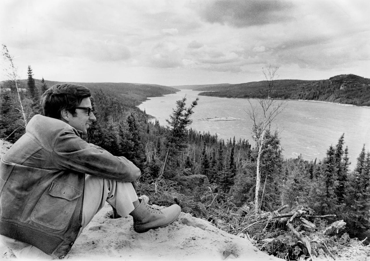 default-121 A man overseeing a river in a black and white photo