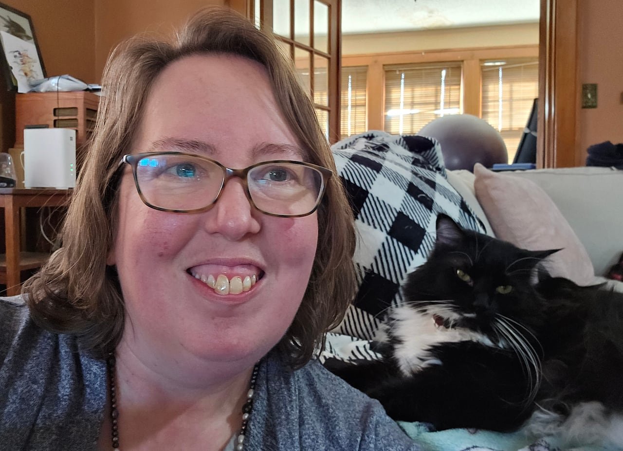 default-172 Photo of Lori Hunt at home with her cat.
